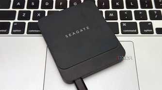 Seagate portable external ssd on top of macbook touchpad