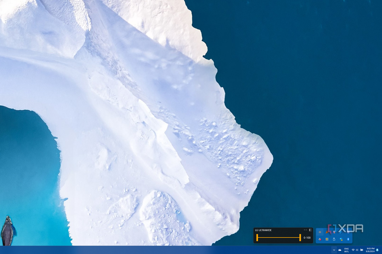A Monitorian flyout showing a slider to lmit the brightness range of a given monitor
