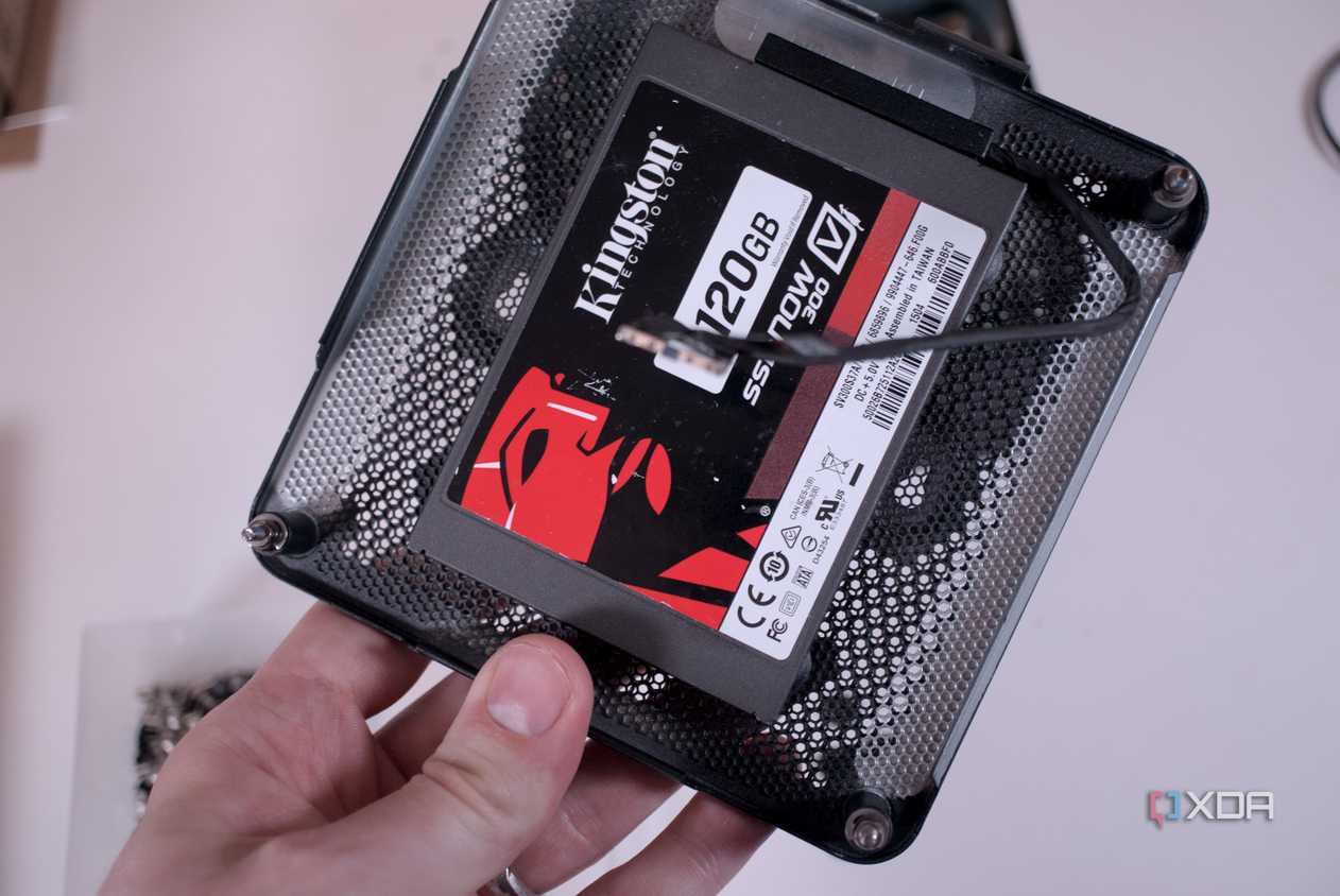 MSI Cubi NUC 1M held in a hand