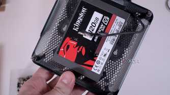 MSI Cubi NUC 1M held in a hand