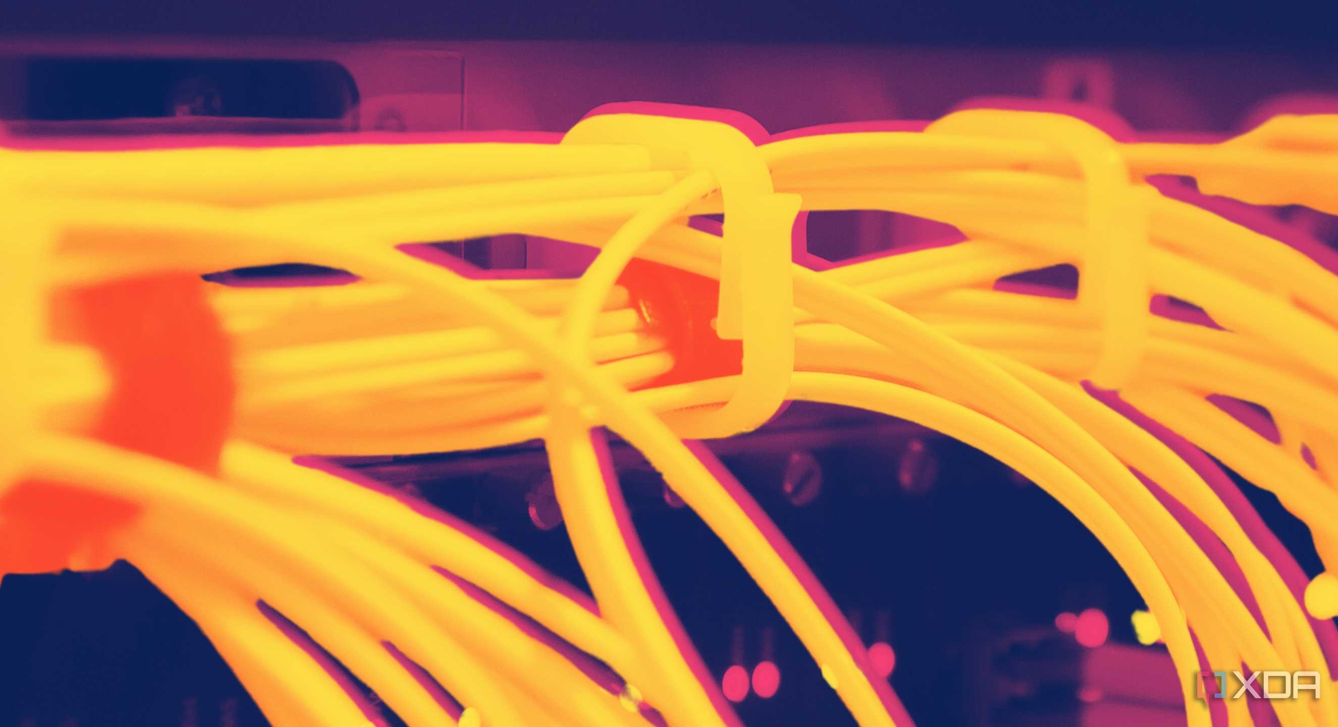 bundles of orange ethernet cables