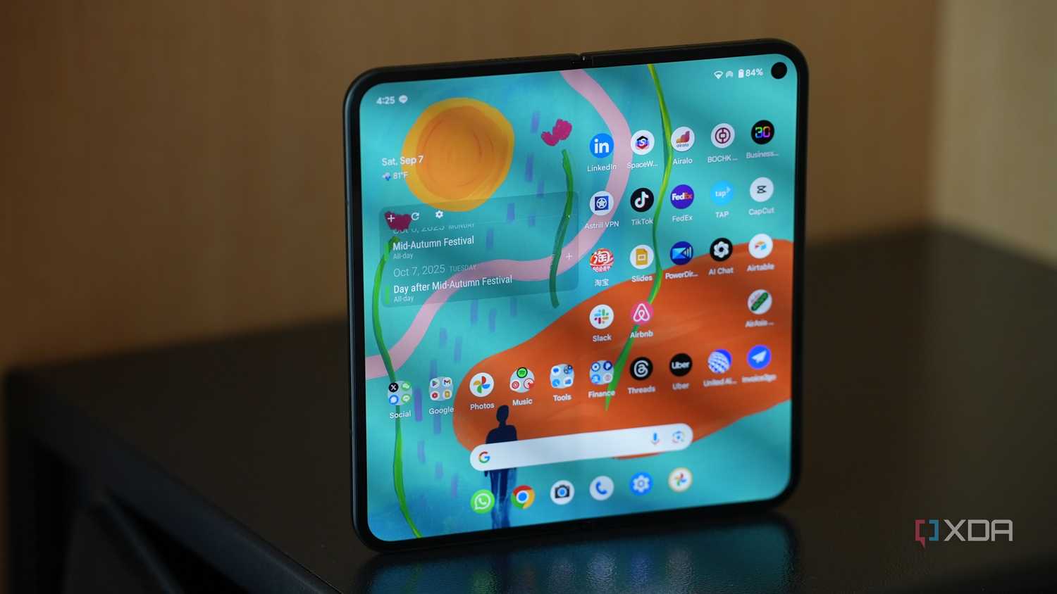 Google Pixel 9 Pro unfolded and standing upright on a desk