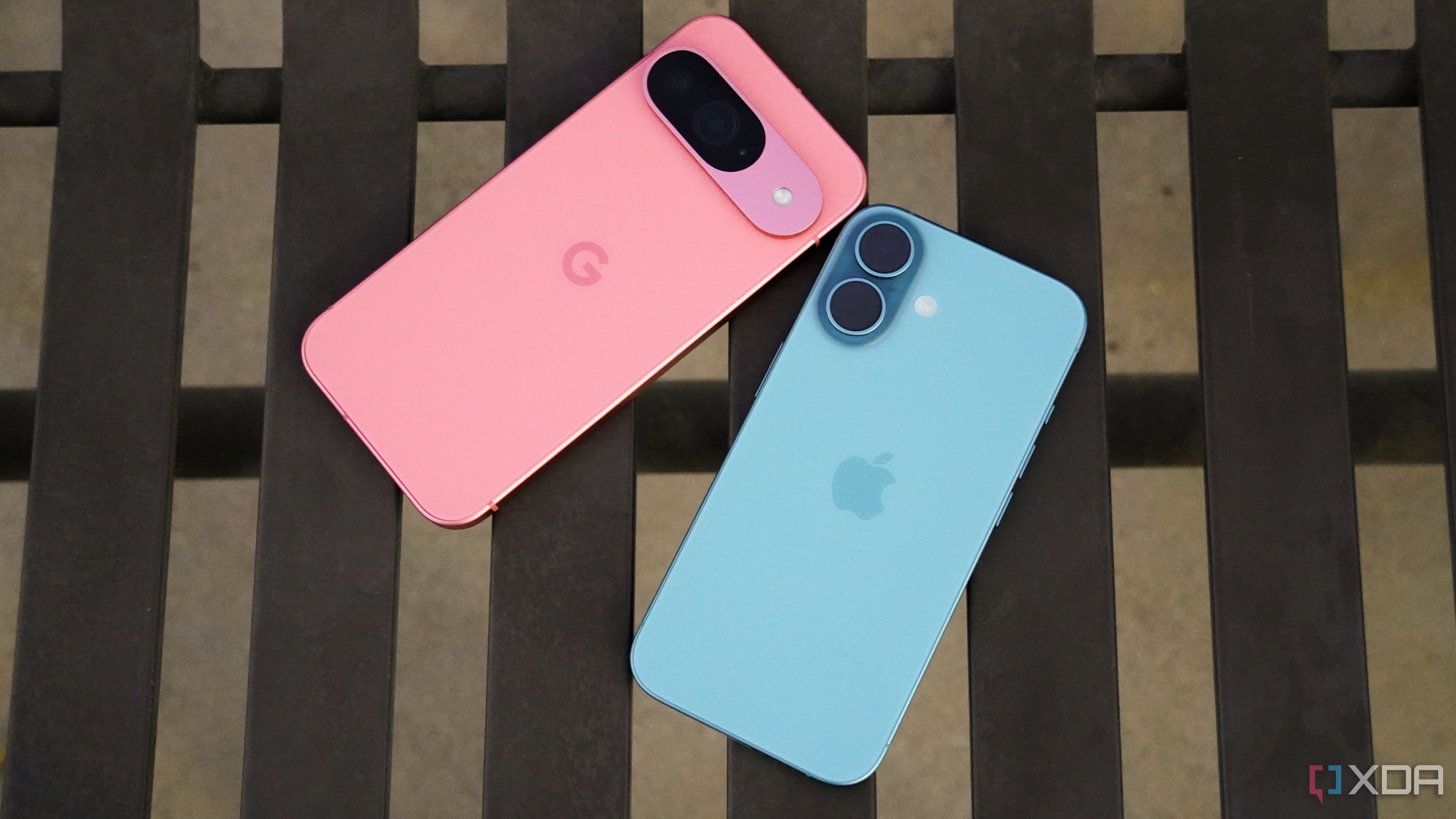 The Pixel 9 and the iPhone 16 on a bench.