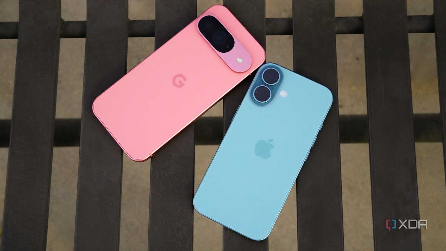 The Pixel 9 and the iPhone 16 on a bench.