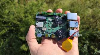 A person holding a Radxa X4 SBC