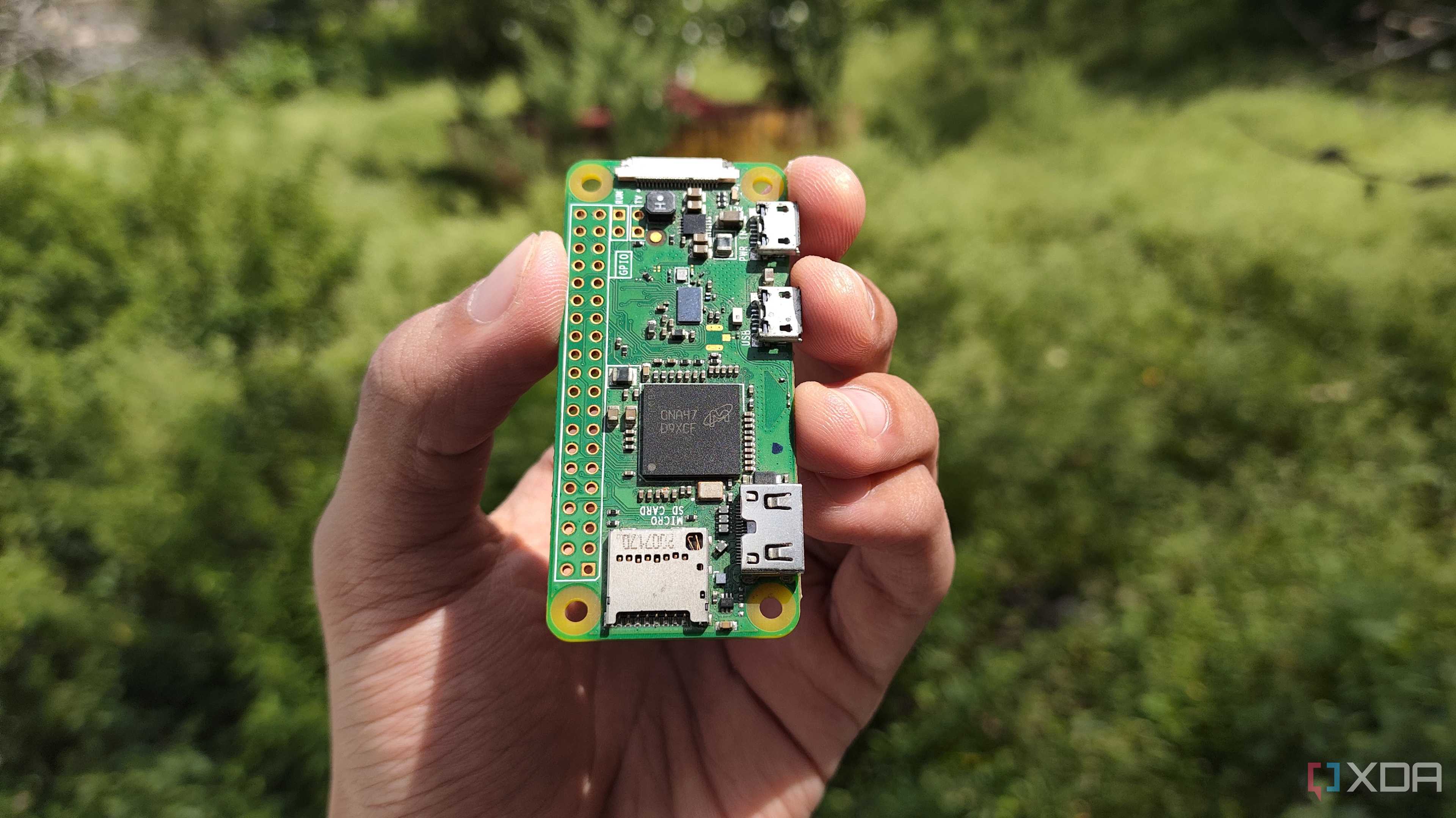 A person holding a Raspberry Pi Zero W
