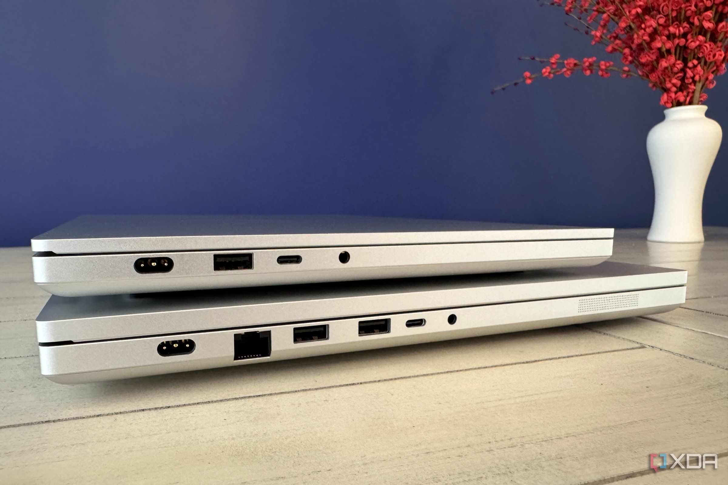 razer blade 14 on top of razer blade 18 showing the left side ports