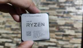 A person holding a Ryzen 5 5600X