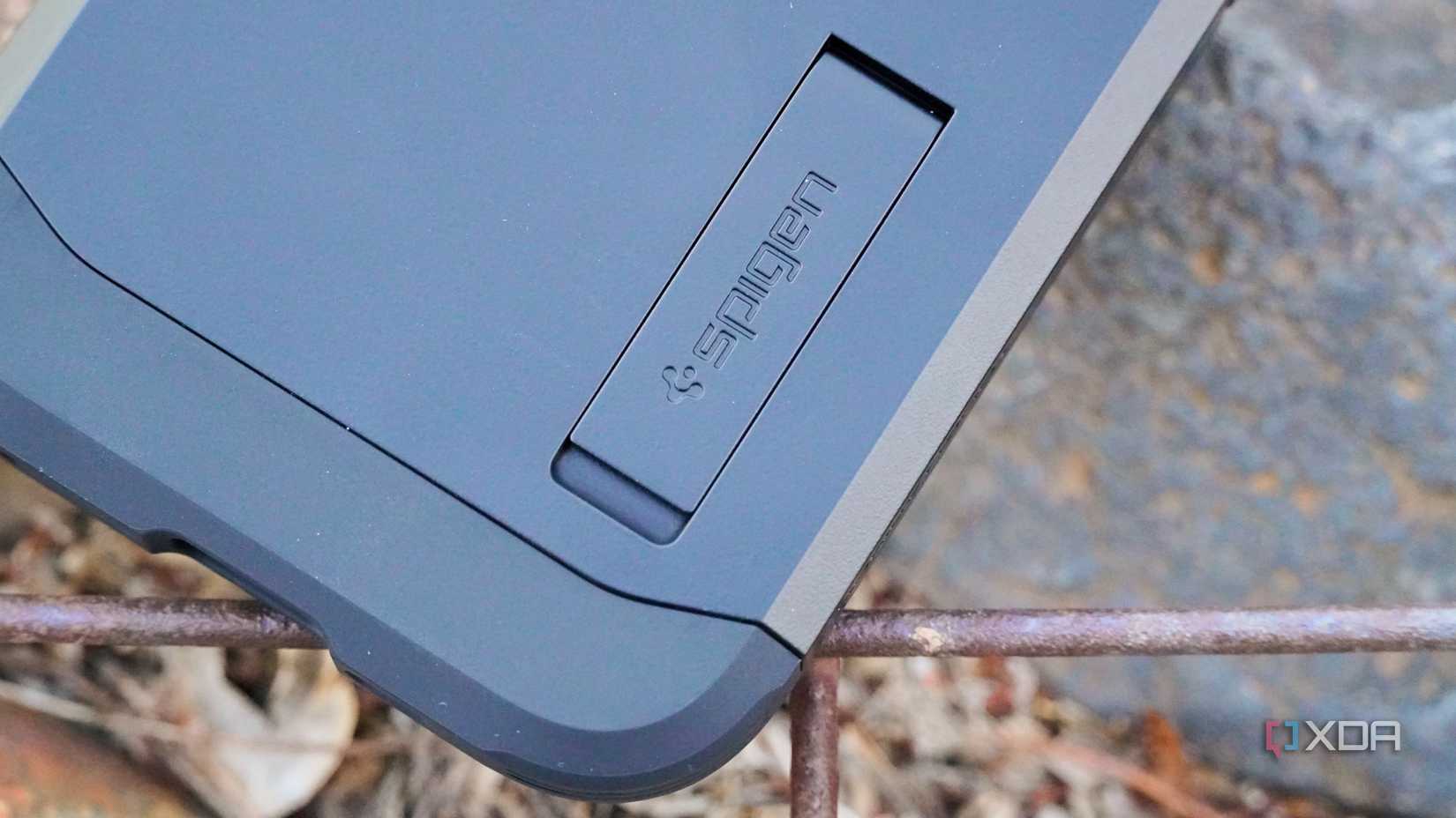 The Spigen brand on a kickstand.
