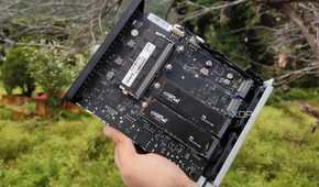 A person holding a TerraMaster F8 SSD Plus NAS