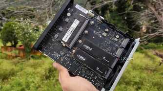 A person holding a TerraMaster F8 SSD Plus NAS