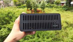 A person holding a TerraMaster F8 SSD Plus NAS