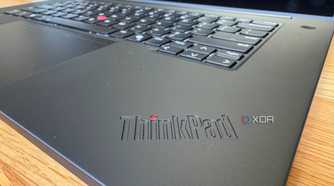 View of the Lenovo ThinkPad P16 Gen 7 from the corner with the ThinkPad logo, keyboard, trackpad, and dispaly visible