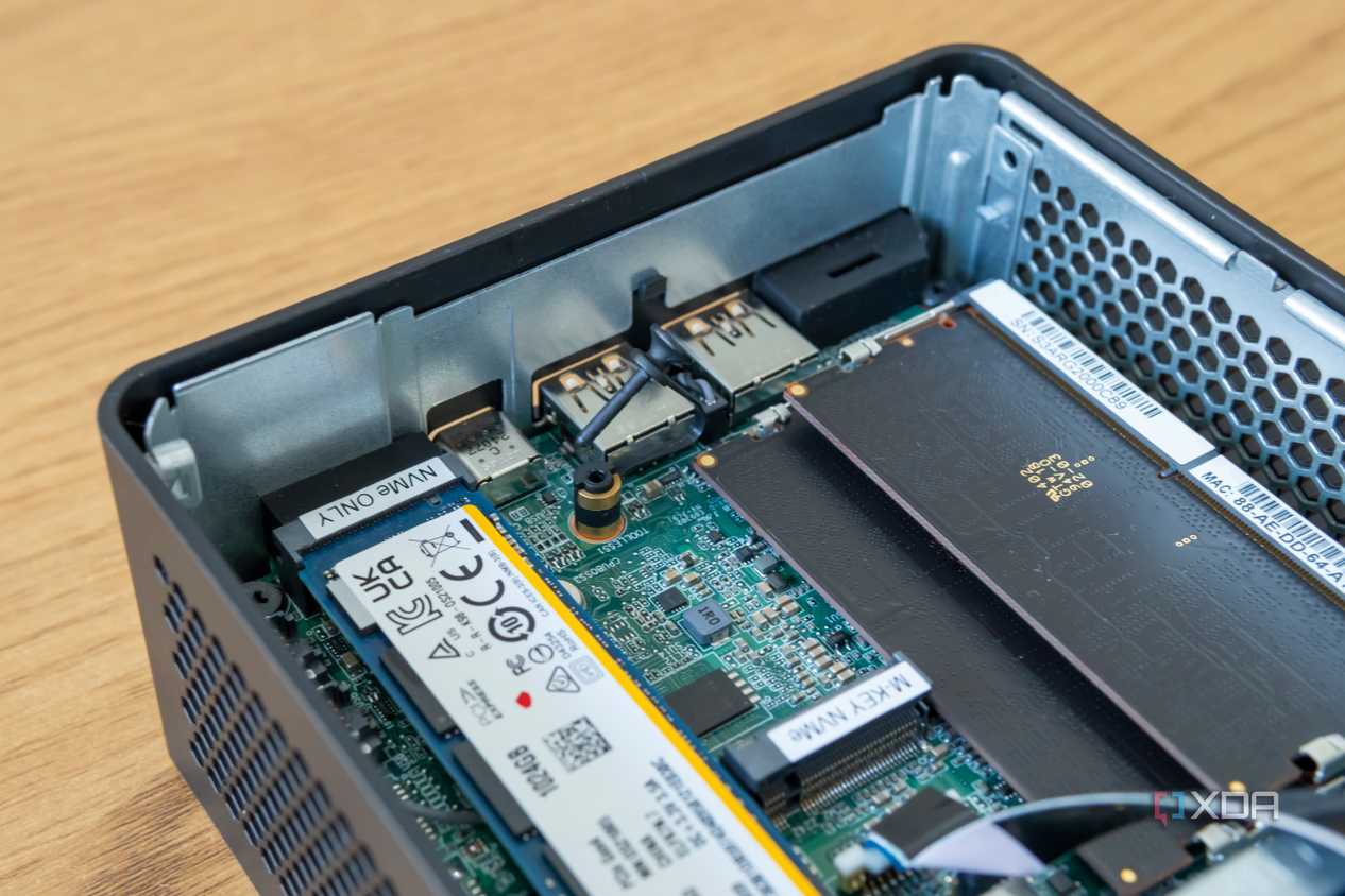 Close-up of the M.2 2242 slot in the Asus NUC 14 Pro with the SSD locking mechanism released