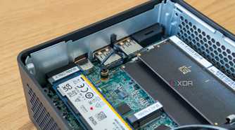 Close-up of the M.2 2242 slot in the Asus NUC 14 Pro with the SSD locking mechanism released