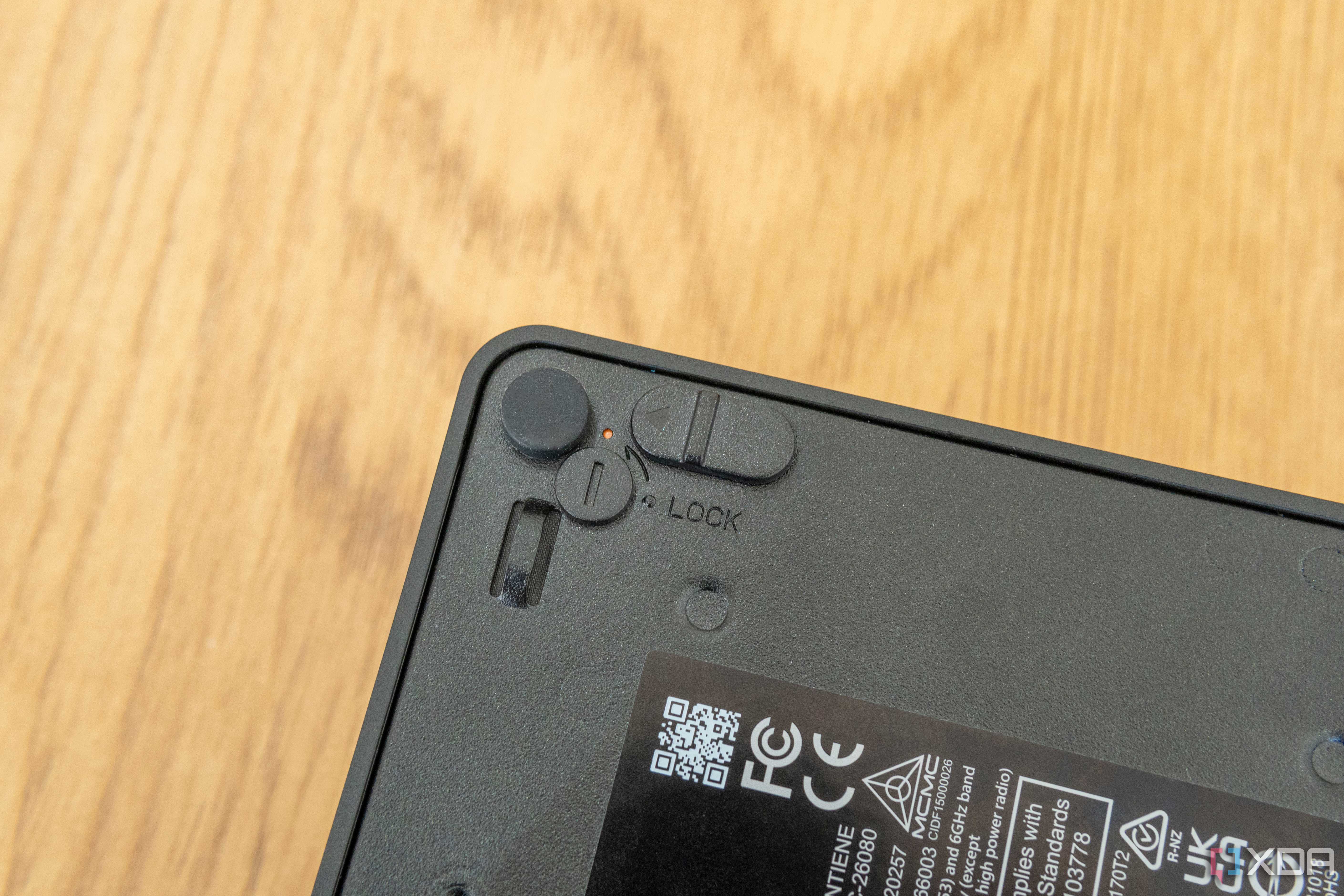 Close-up of the lock slider on the bottom of the Asus NUC 14 Pro
