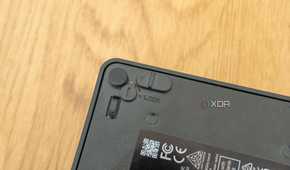 Close-up of the lock slider on the bottom of the Asus NUC 14 Pro
