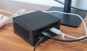 Angled rear view of thew Asus NUC 14 Pro with some peripherals connected