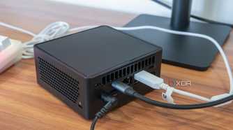 Angled rear view of thew Asus NUC 14 Pro with some peripherals connected