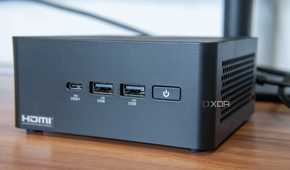 Close-up view of the ports and power button on the front of the Asus NUC 14 Pro