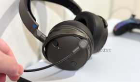 audeze maxwell boom mic held in front of the headset