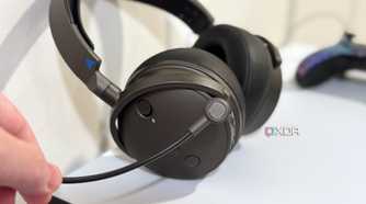 audeze maxwell boom mic held in front of the headset