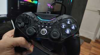 A person holding a GameSir Tarantula Pro controller