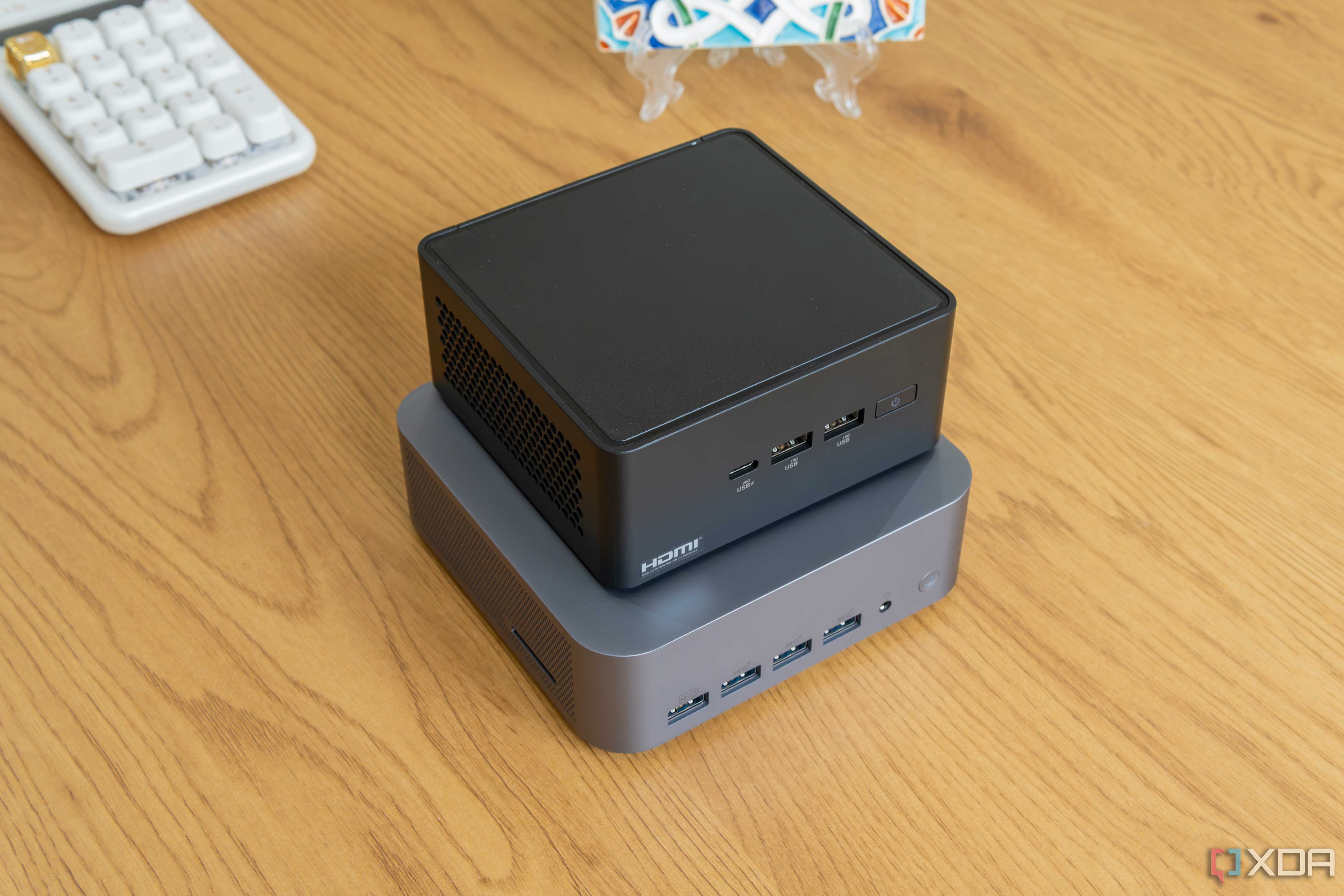 Angled view of the Geekom GT1 Mega with the Asus NUC 14 Pro stacked on top of it