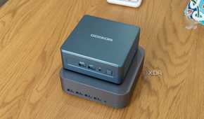 Angled view of the Geekom GT1 Mega with the Geekom Mini IT13 stacked on top of it