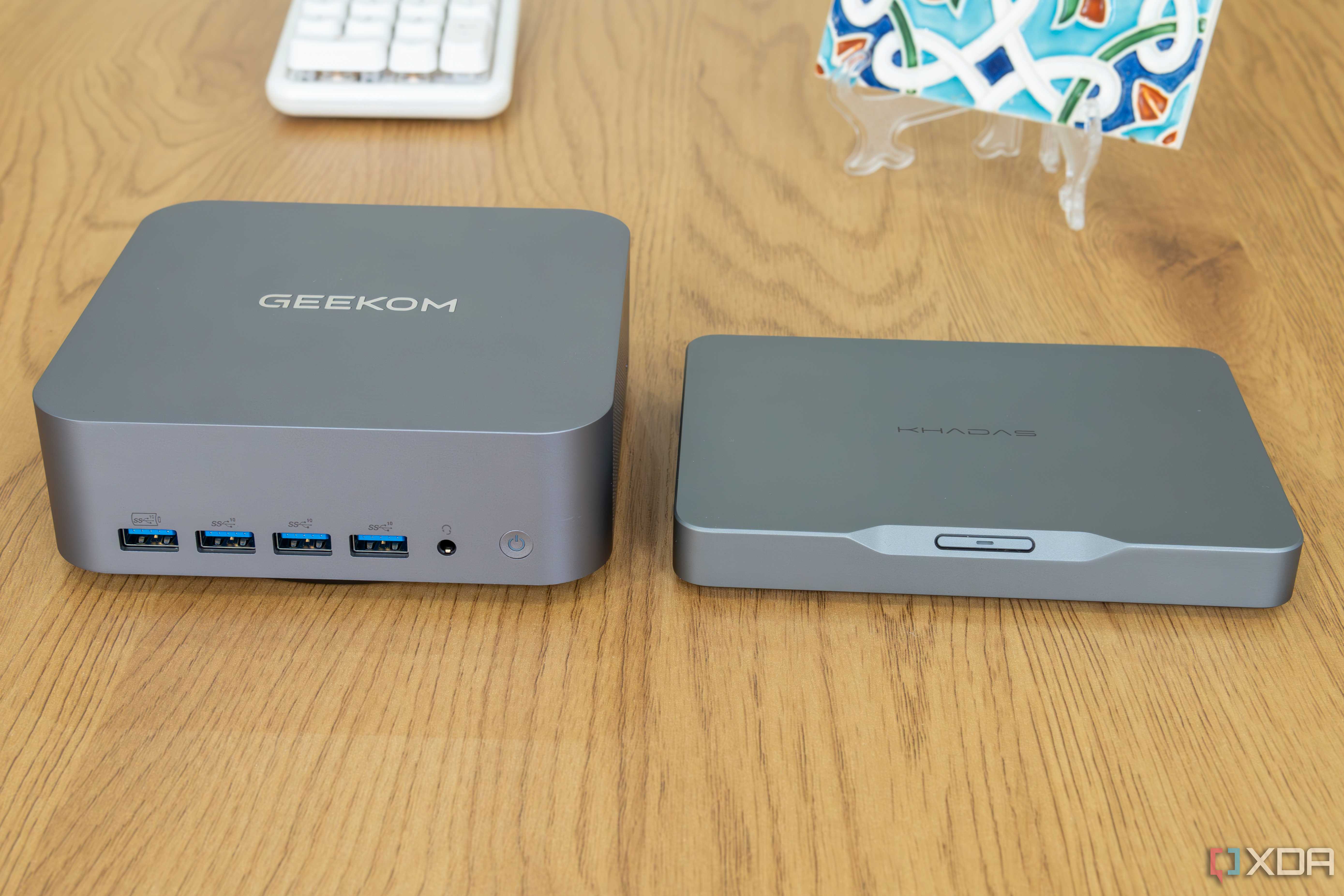 Front view of the Geekom GT1 Mega next to the Khadas Mind