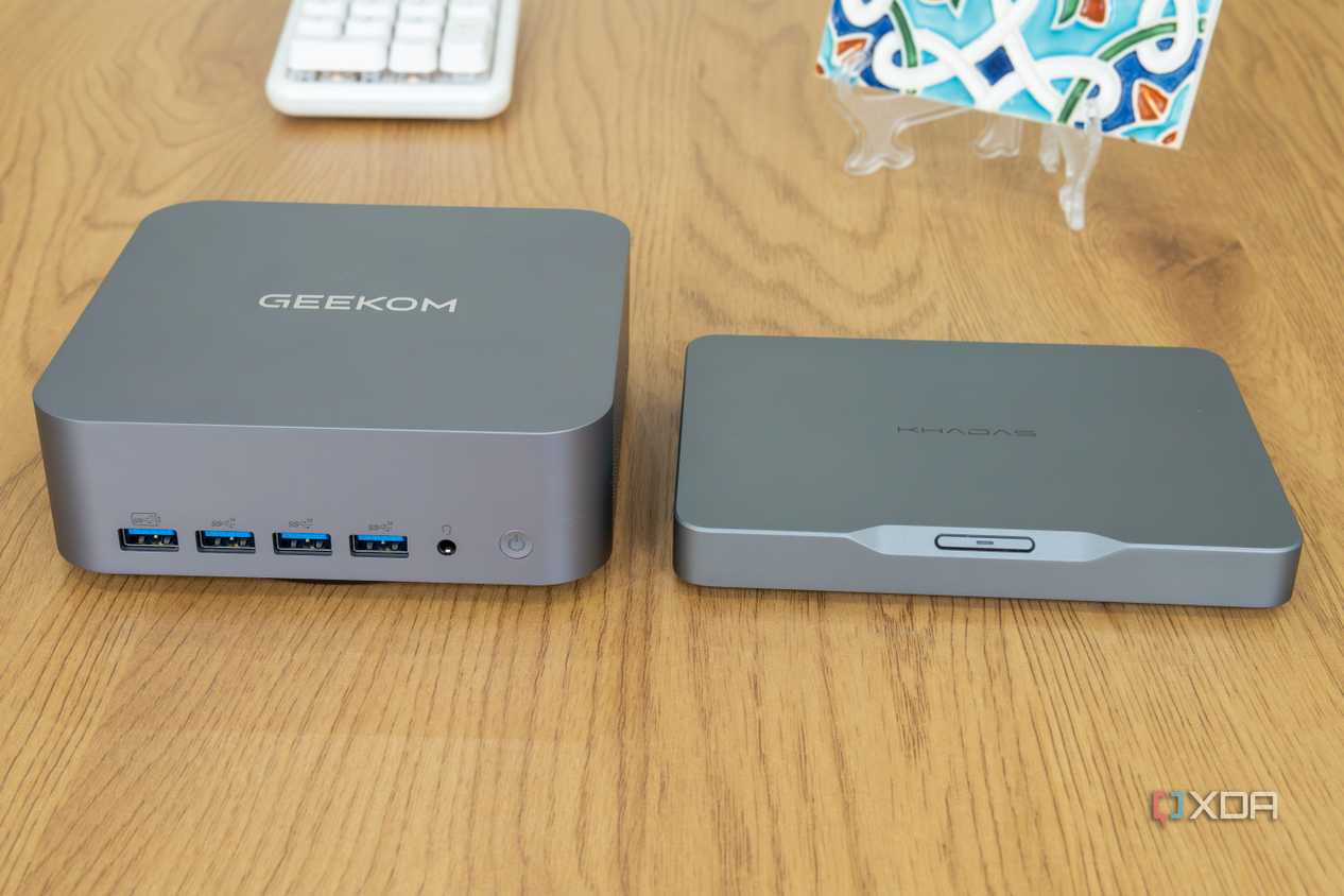 Front view of the Geekom GT1 Mega next to the Khadas Mind