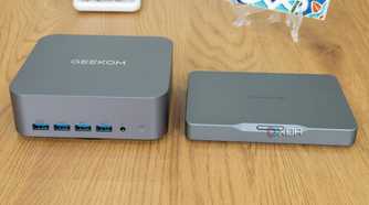 Front view of the Geekom GT1 Mega next to the Khadas Mind