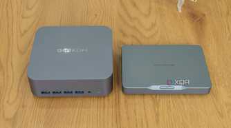 Overhead front view of the Geekom GT1 Mega next to the Khadas Mind