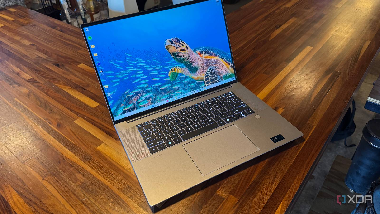 The HP ZBook Studio G11 on a wooden table