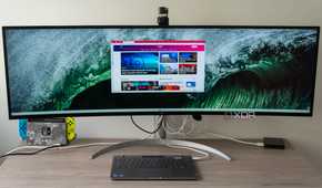 A Lenovo ThinkBook Plus Gen 5 Hybrid Station connected to a monitor to be used as a desktop PC