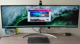 A Lenovo ThinkBook Plus Gen 5 Hybrid Station connected to a monitor to be used as a desktop PC