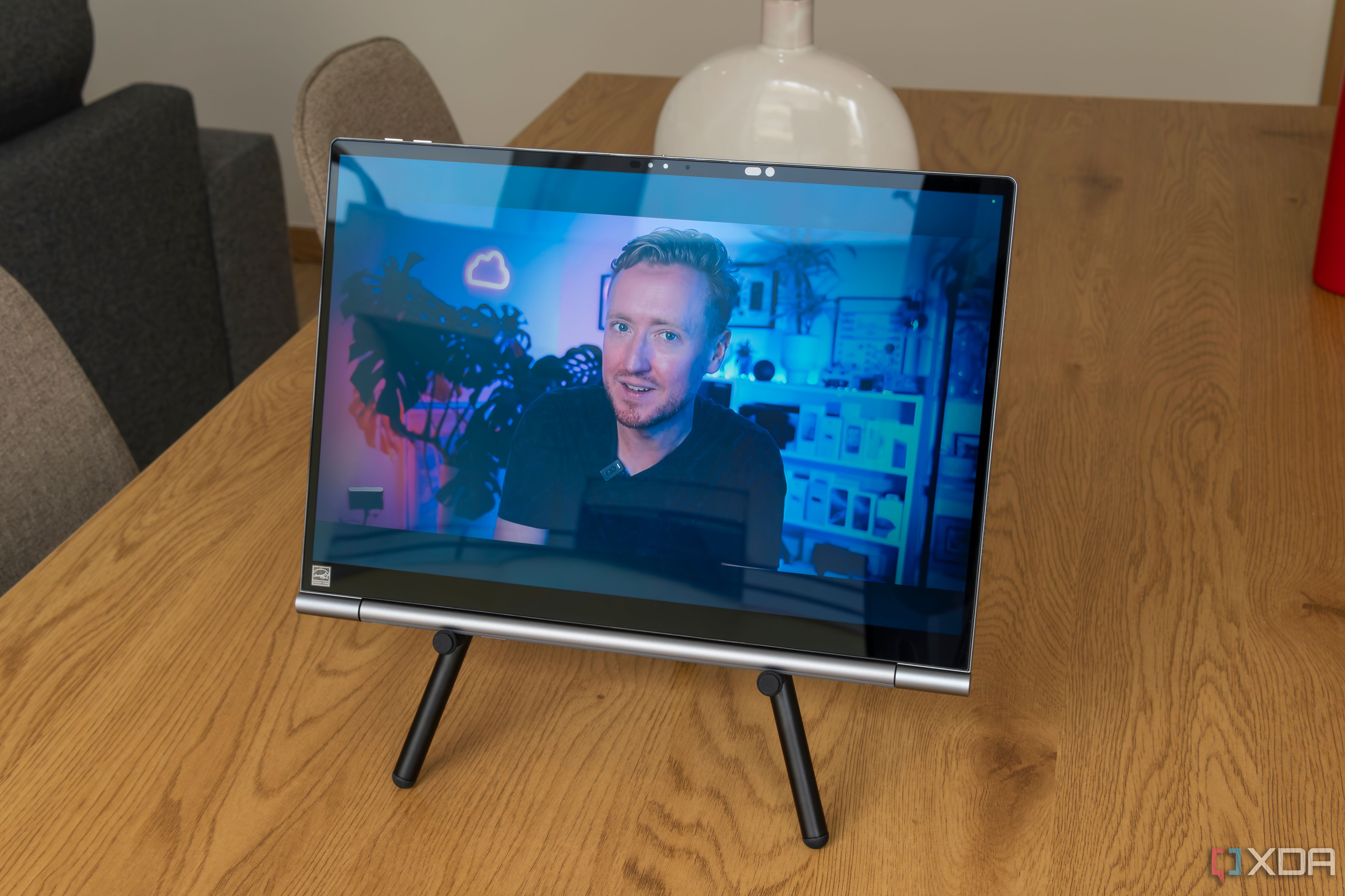 A Lenovo ThinkBook Plus Gen 5 Hybrid Tab playing a YouTube video
