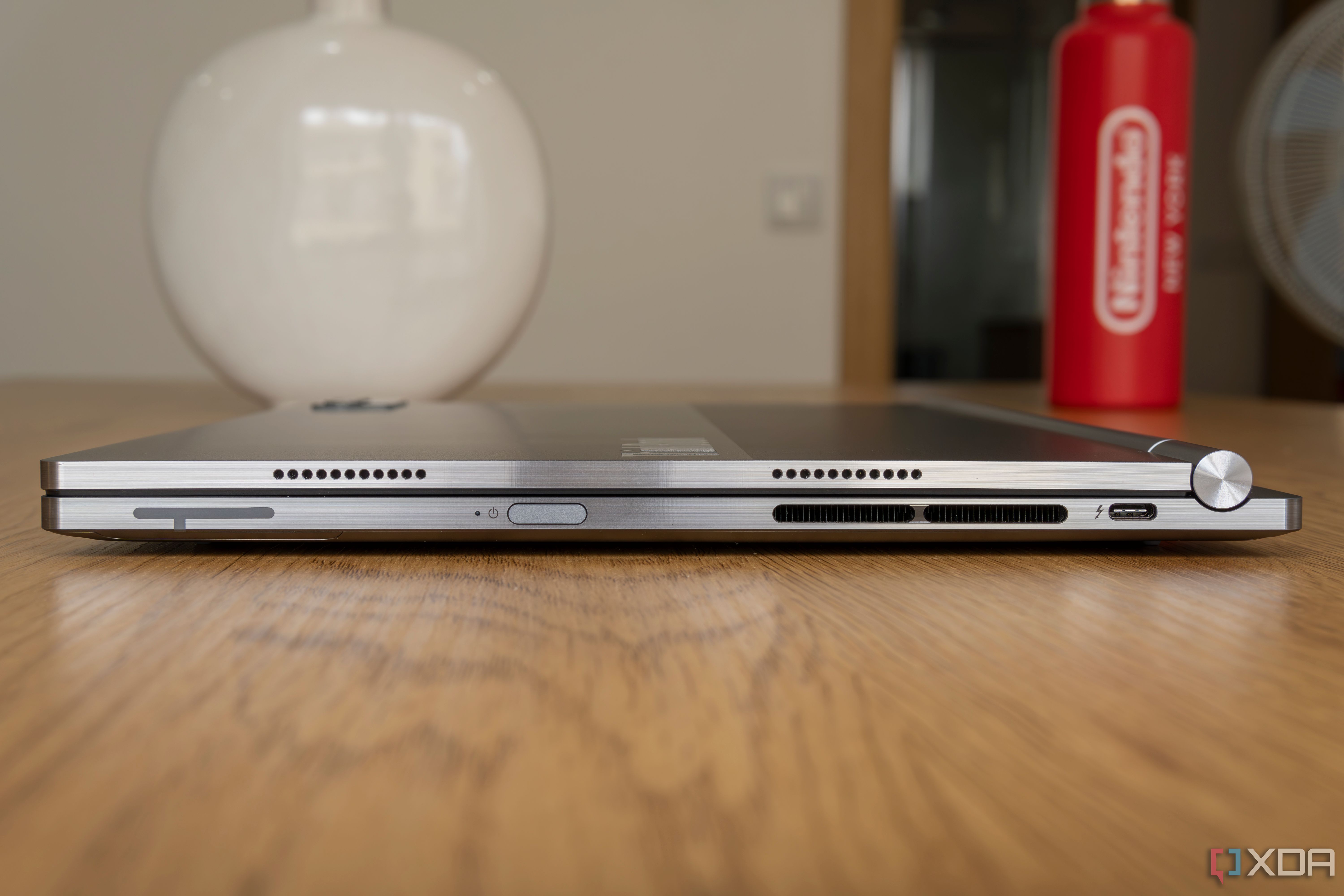 Right-side view of the Lenovo ThinkBook Plus Gen 5 Hybrid with showing a Thunderbolt 4 port and power button