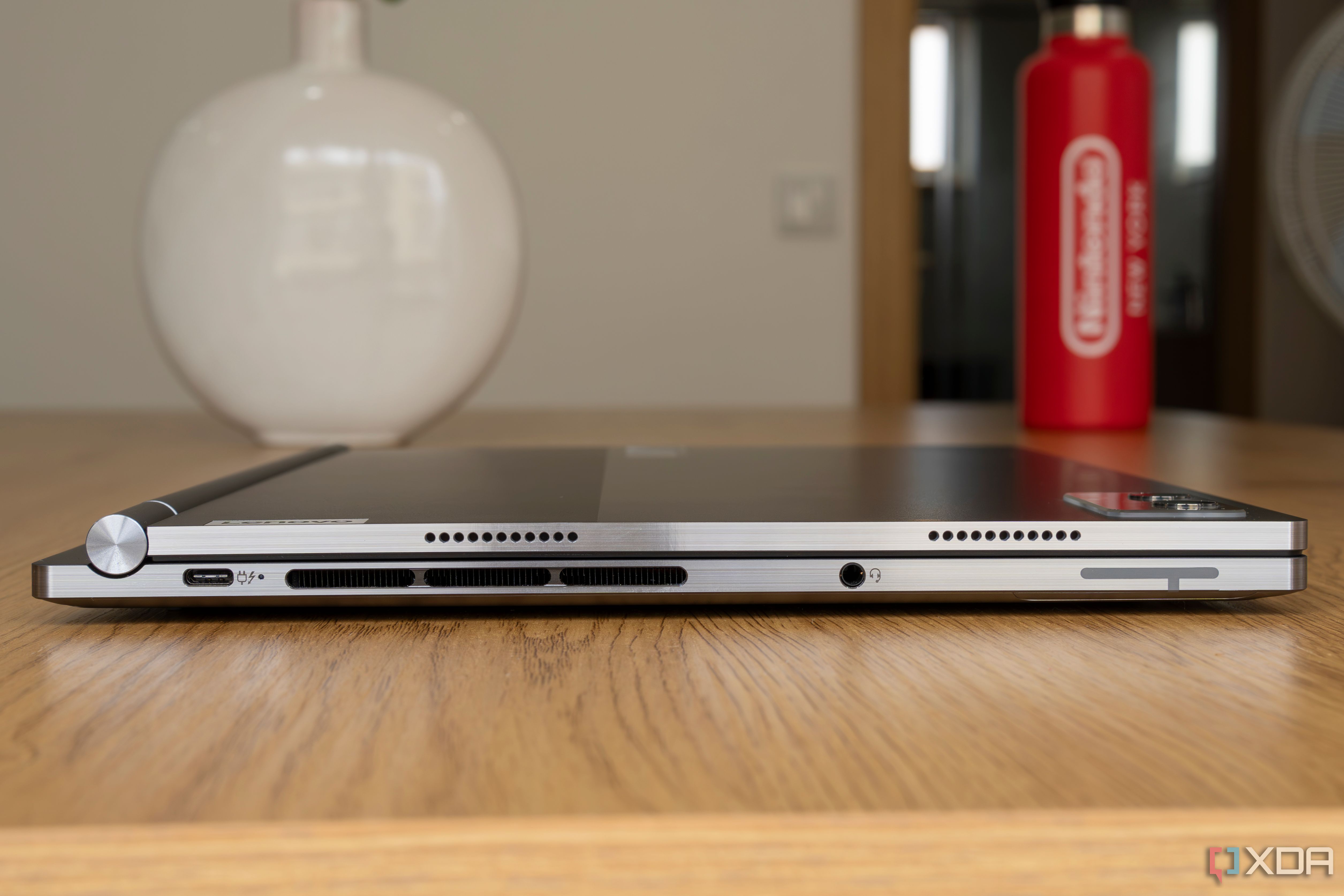 Left-side view of the Lenovo ThinkBook Plus Gen 5 Hybrid with showing a Thunderbolt 4 port and headphone jack