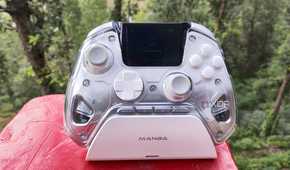 A Manba One controller resting on its charging dock