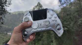 A person holding the Manba One controller