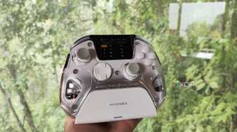 A Manba One controller resting on its charging dock