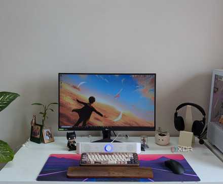 5 Non-Hardware PC Upgrades Often Overlooked for Peak Performance 2 A PC setup showing a PC, monitor, and desk with accessories