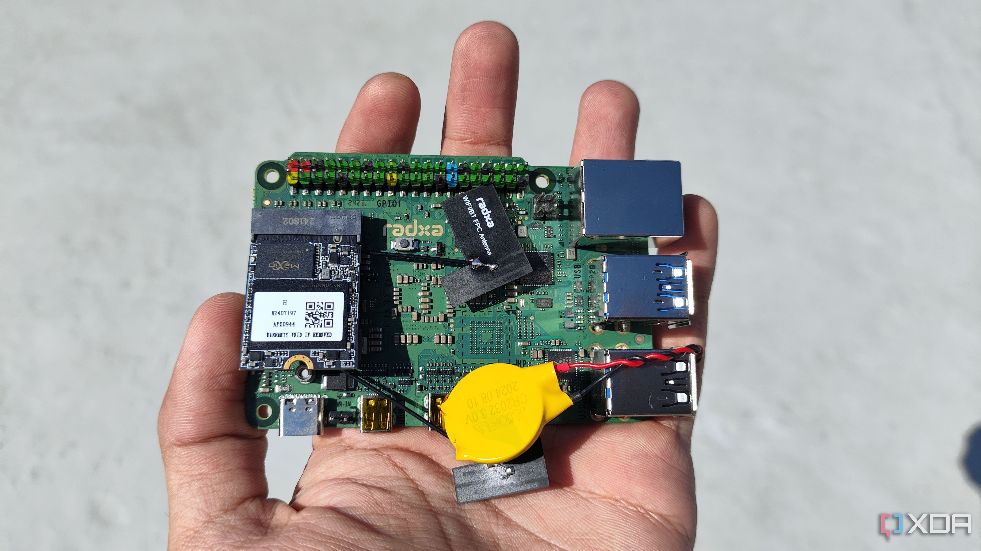 A person holding a Radxa X4 SBC