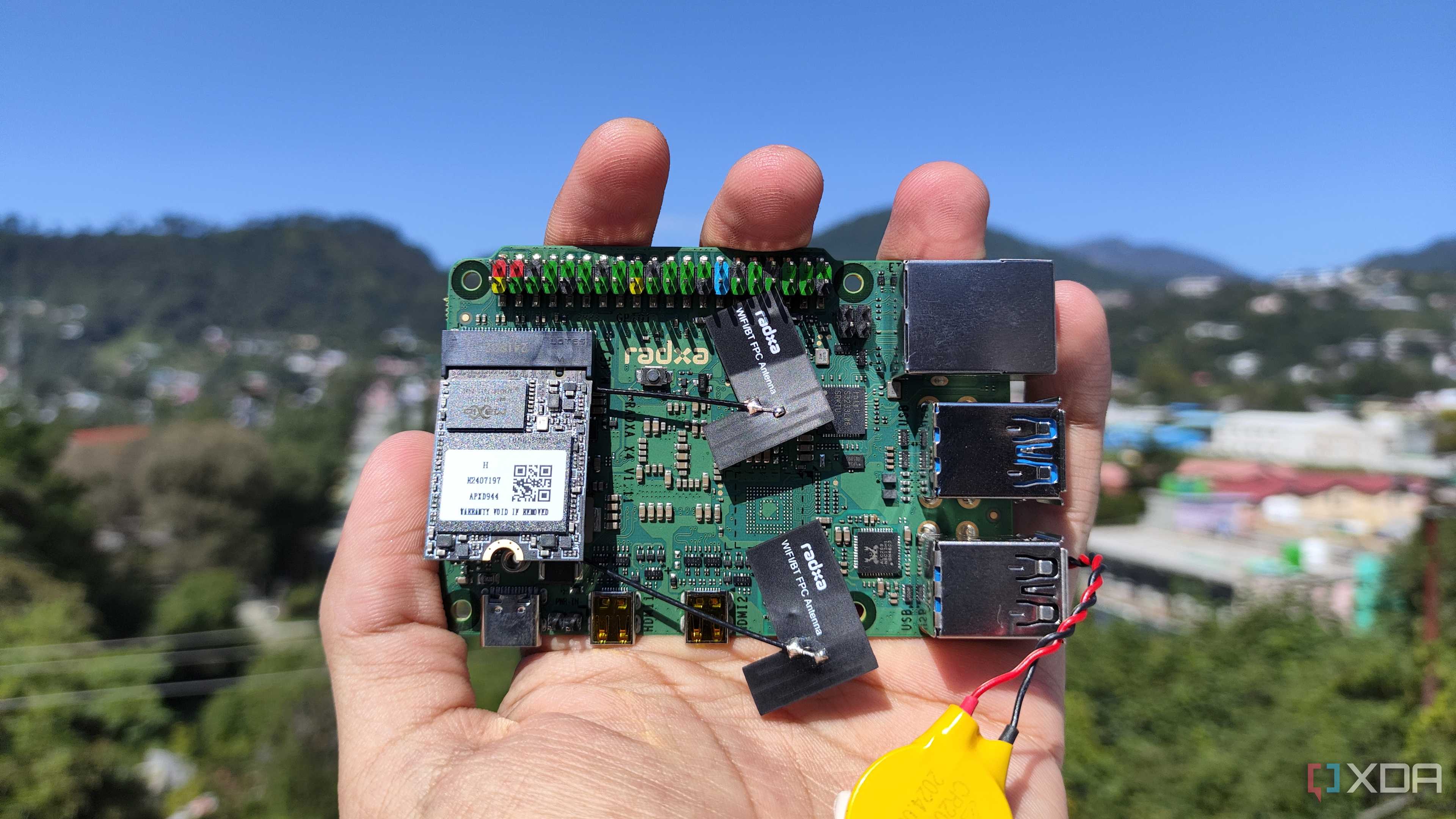 A person holding a Radxa X4 SBC