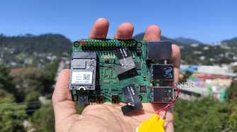 A person holding a Radxa X4 SBC