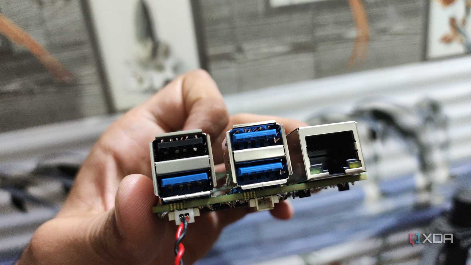 A person holding a Radxa X4