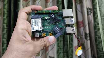 A person holding a Radxa X4 SBC