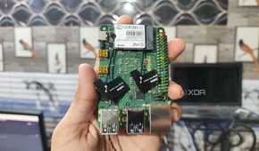 A person holding a Radxa X4 SBC