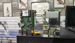 A Radxa X4 next to a Raspberry Pi 5